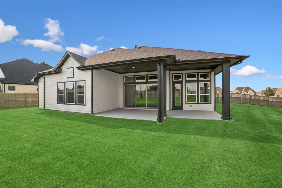 Front exterior of a new home in Pecan Square - Estates, Northlake, TX, highlighting curb appeal (Image 21). Front exterior of a new home in Pecan Square - Estates, Northlake, TX, highlighting curb appeal (Image 21).