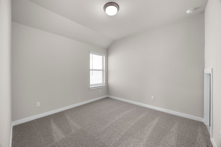 Bedroom in the Magnolia home plan by Trophy Signature Homes – REPRESENTATIVE PHOTO Bedroom in the Magnolia home plan by Trophy Signature Homes – REPRESENTATIVE PHOTO