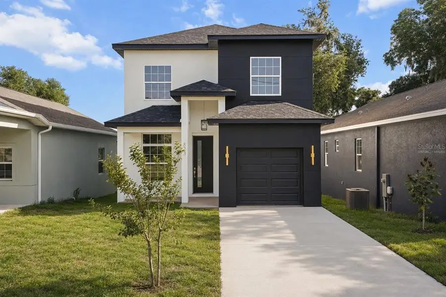 Front exterior of a new home in , Eustis, FL, highlighting curb appeal (Image 1). Front exterior of a new home in , Eustis, FL, highlighting curb appeal (Image 1).
