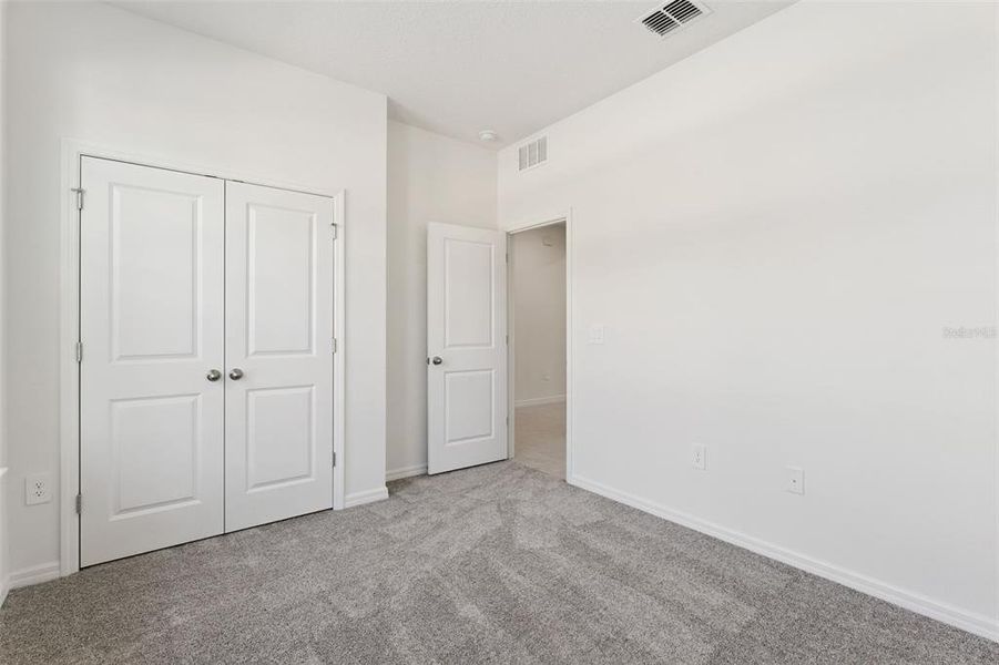 Spacious, unfurnished interior of a new home in Estes Reserve, Eustis (Image 14).