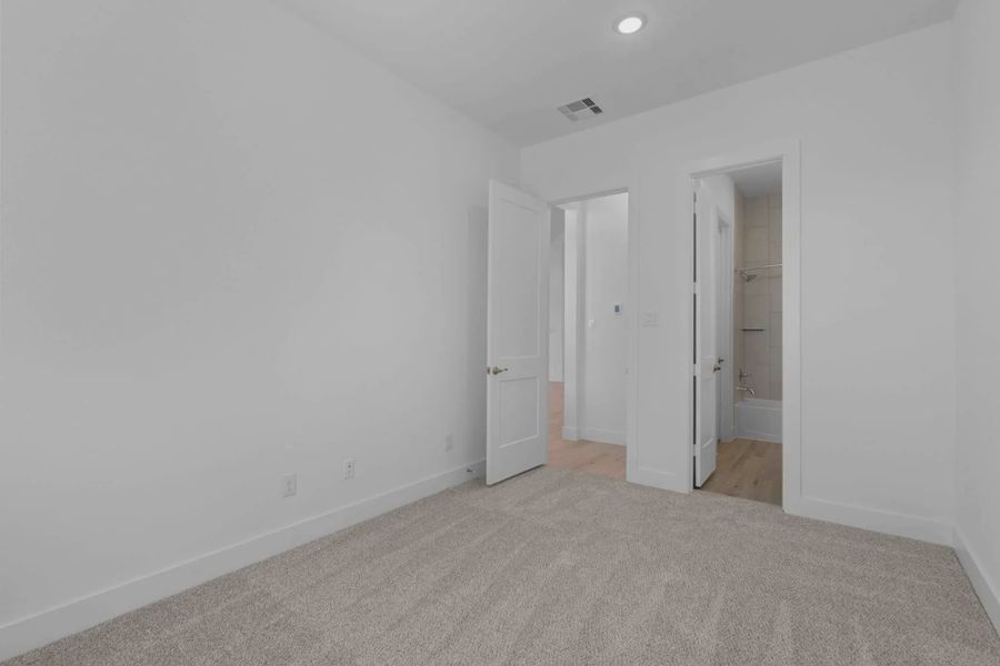 Representative unfurnished interior of a home built from the Lakeway by Chesmar Homes in Meridiana 50's, Manvel (Image 49).