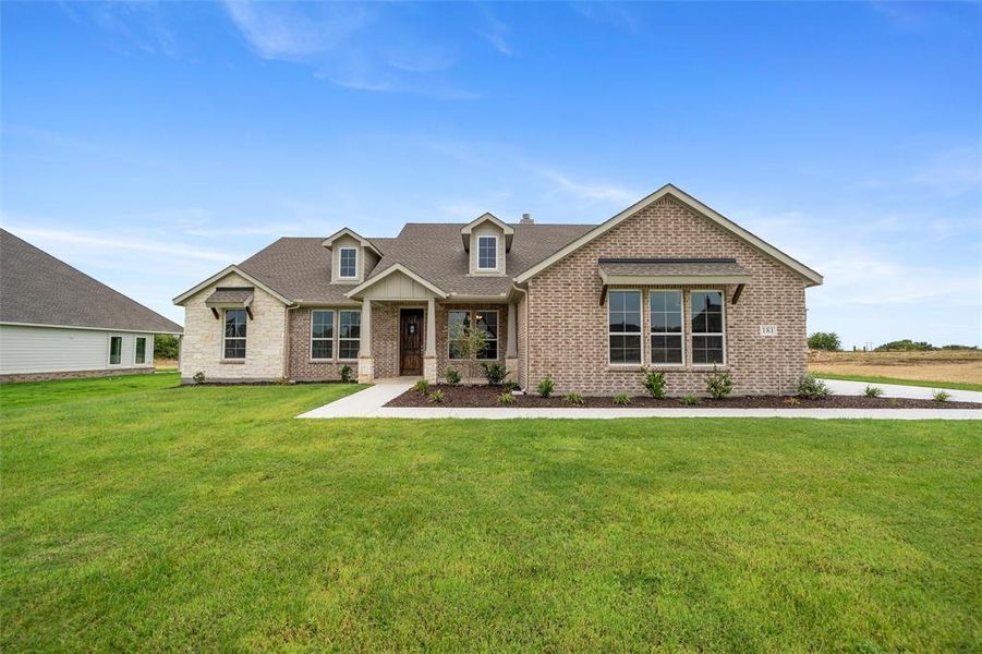Front exterior of a new home in Fairview Meadows, New Fairview, TX, highlighting curb appeal (Image 16).
