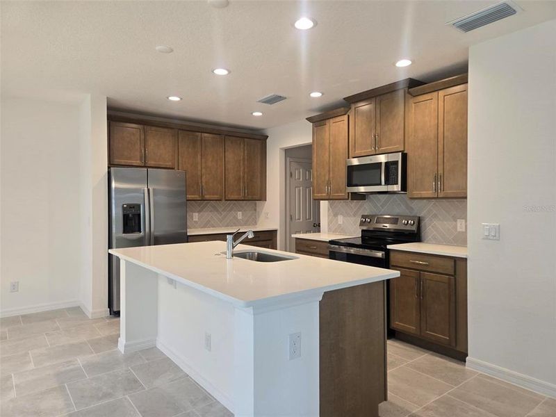 Furnished interior view inside a new home in Preservation Pointe, Davenport (Image 3).