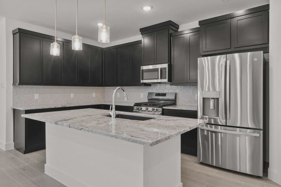 Representative furnished interior of a home built from the Carriagehouse by Chesmar Homes in Meridiana Townhomes, Iowa Colony (Image 54).