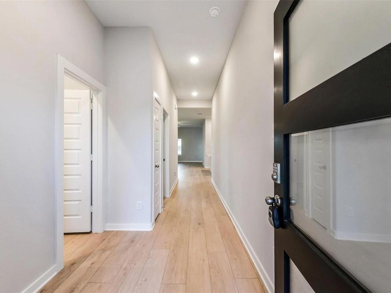 Spacious, unfurnished interior of a new home in Sunterra, Katy (Image 18).