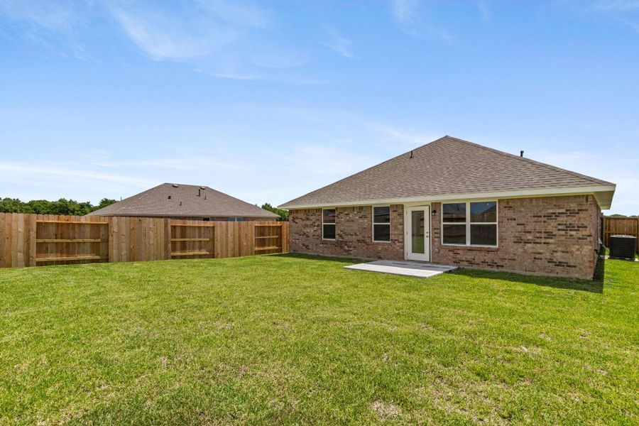 Exterior details and patio area of a home in River Ranch Trails, Dayton (Image 4). Exterior details and patio area of a home in River Ranch Trails, Dayton (Image 4).