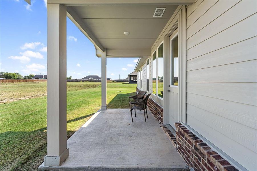Exterior details and patio area of a home in Nash Estates, Tom Bean (Image 26).