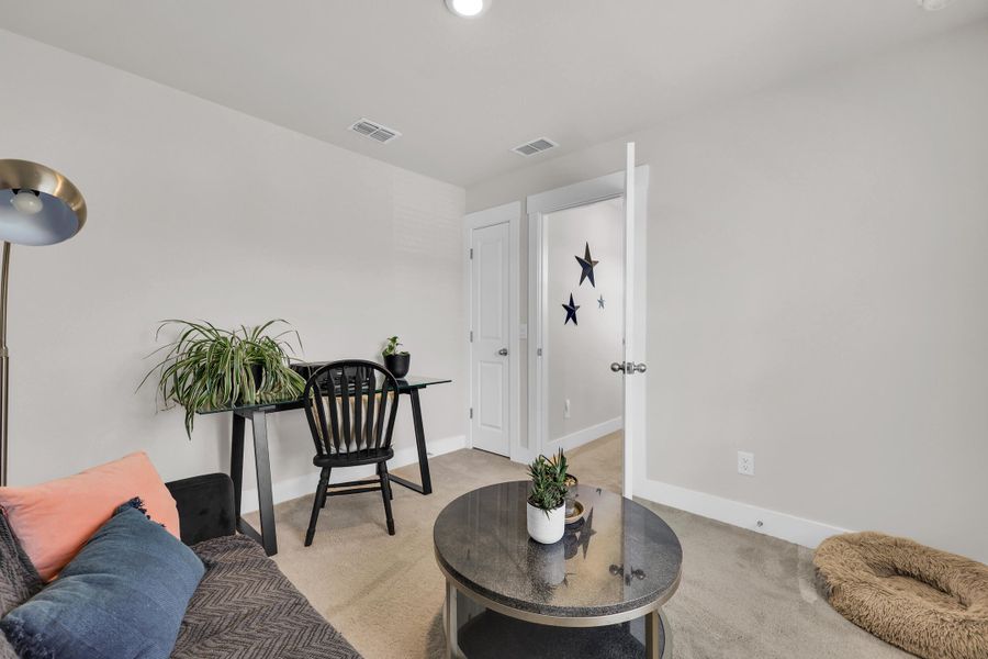 Furnished interior view inside a new home in Jasmine Point at Lakes of Cane Bay, Summerville (Image 14).
