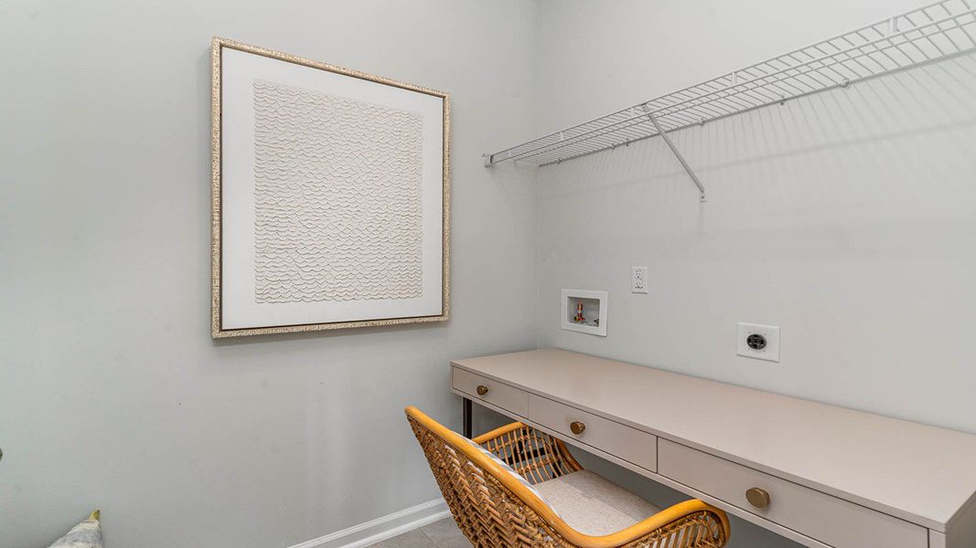 Representative furnished interior of a home built from the CALI by D.R. Horton in Harper Meadows, Loris (Image 13).