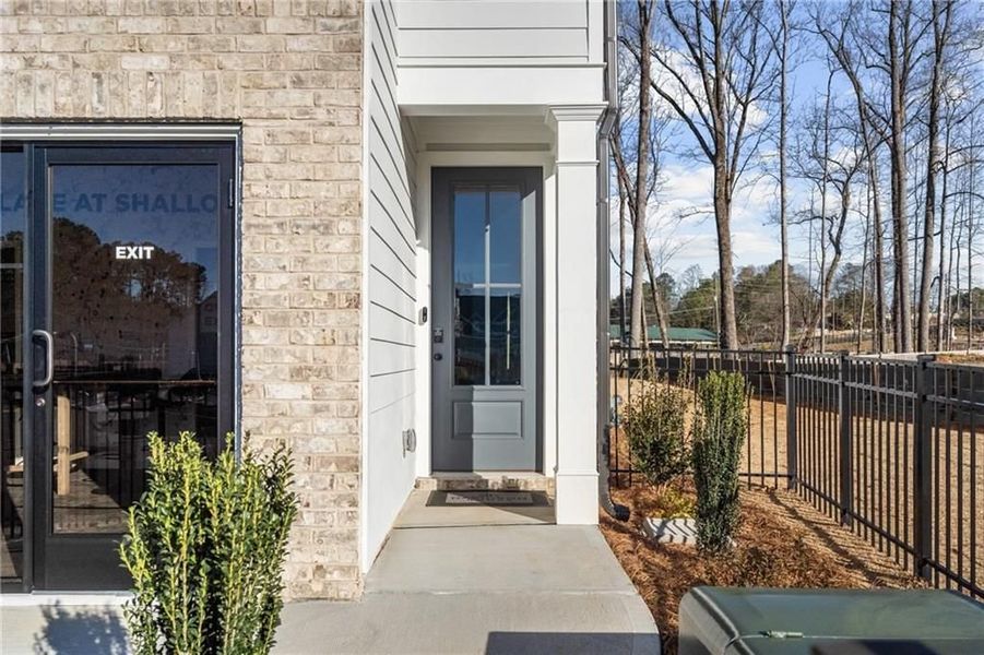 Front exterior of a new home in The Village at Shallowford, Kennesaw, GA, highlighting curb appeal (Image 77). Front exterior of a new home in The Village at Shallowford, Kennesaw, GA, highlighting curb appeal (Image 77).