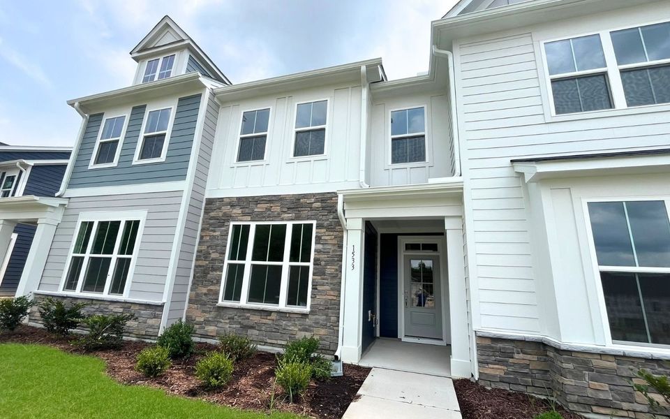 Front exterior of a new home in Wendell Falls, Wendell, NC, highlighting curb appeal (Image 13).