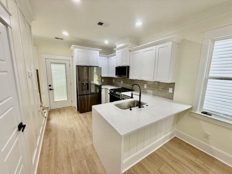 Furnished interior view inside a new home in , North Charleston (Image 9).