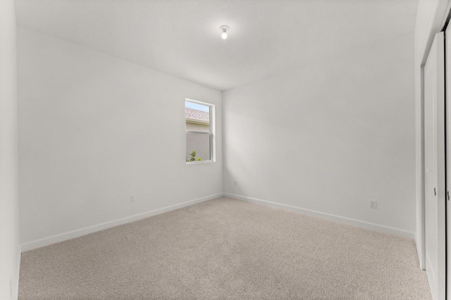 Spacious, unfurnished interior of a new home in Tradition - Cadence, Port St. Lucie (Image 11).