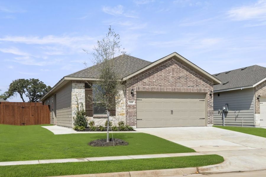 Representative exterior photo of a completed home built from the Hickory by Impression Homes in ValleyBrooke, Mesquite, TX (Image 2).