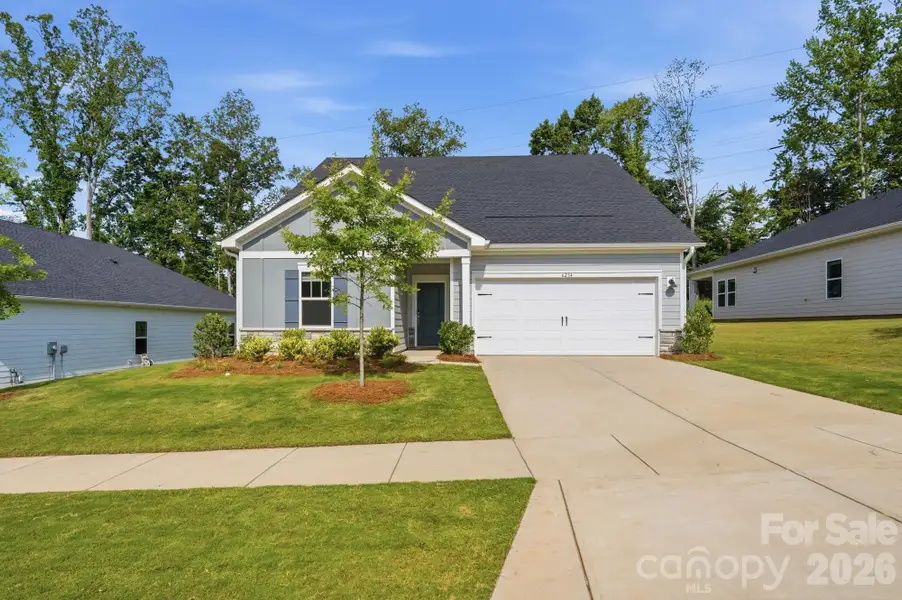 Front exterior of a new home in , Charlotte, NC, highlighting curb appeal (Image 24).