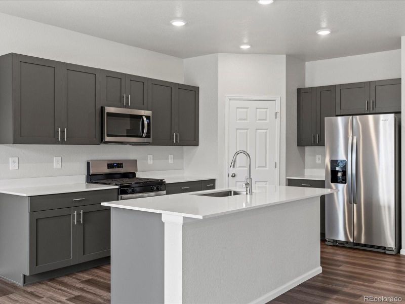 Furnished interior view inside a new home in Ridgeline Vista: The Flora Collection, Brighton (Image 10). Furnished interior view inside a new home in Ridgeline Vista: The Flora Collection, Brighton (Image 10).