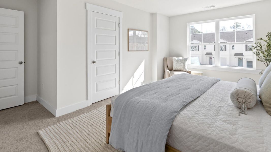 Furnished interior view inside a new home in Waterside Townhomes, Surf City (Image 21).