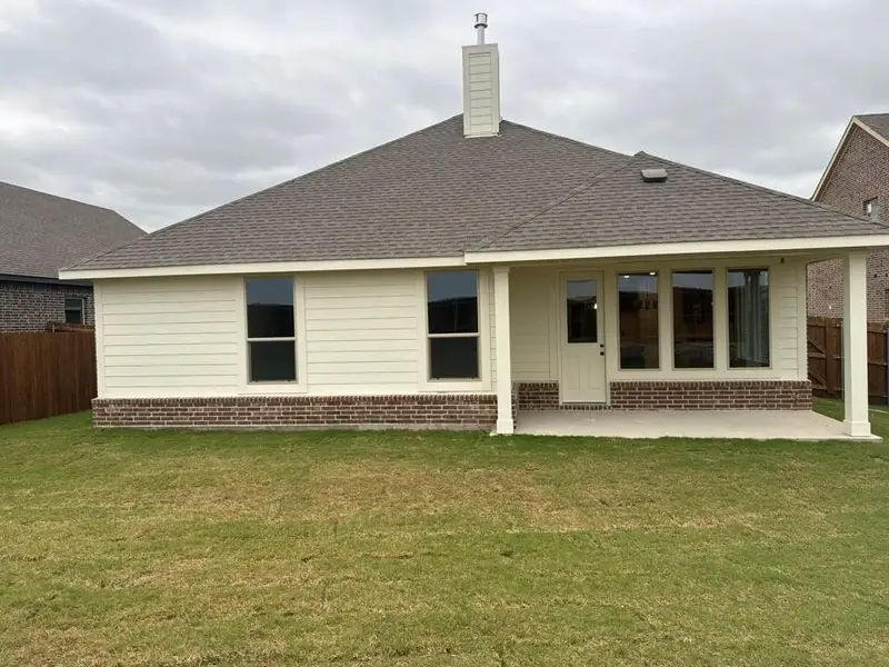 Exterior details and patio area of a home in Cedar Ridge Estates, Anna (Image 4).