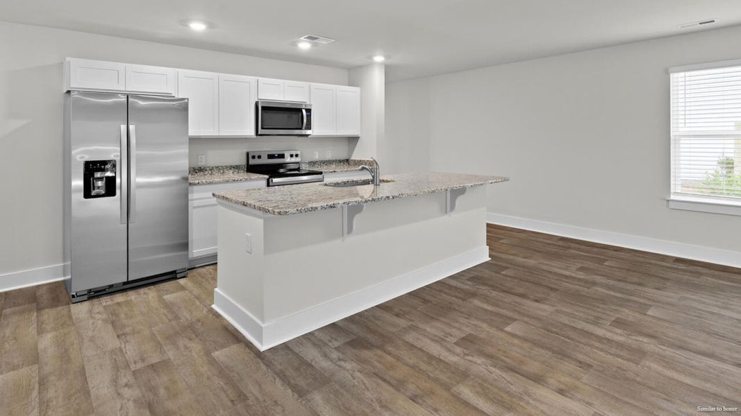 Furnished interior view inside a new home in Vineyard Trail, Jacksonville (Image 9).