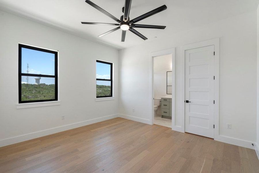 Spacious, unfurnished interior of a new home in Milky Way at River Place, Austin (Image 21).