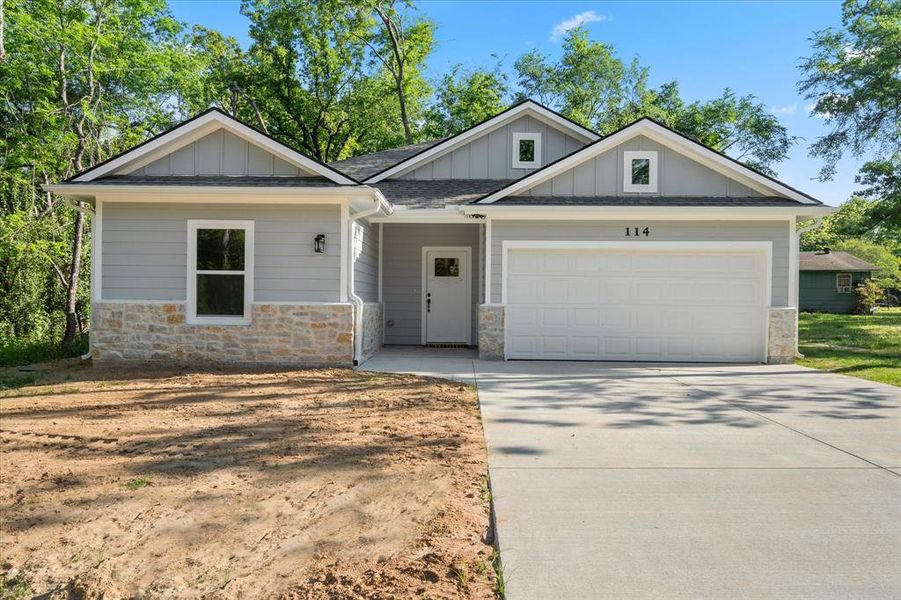 Front exterior of a new home in , Payne Springs, TX, highlighting curb appeal (Image 16). Front exterior of a new home in , Payne Springs, TX, highlighting curb appeal (Image 16).