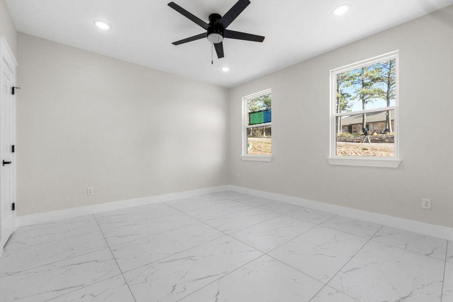 Unfurnished room with ceiling fan