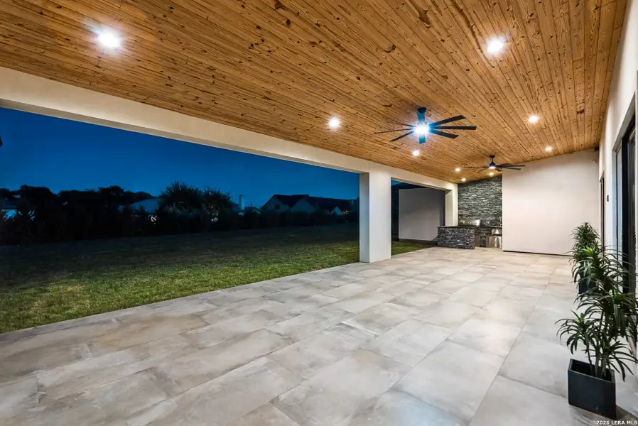Exterior details and patio area of a home in , San Antonio (Image 39).