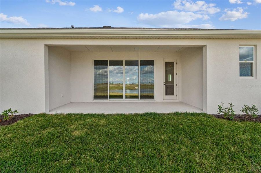 Exterior details and patio area of a home in Coasterra, Palmetto (Image 26).
