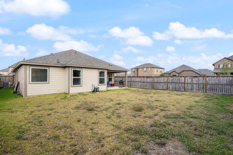 Exterior details and patio area of a home in Sierra Vista, Iowa Colony (Image 25).