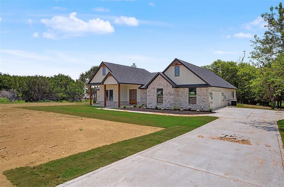 Front exterior of a new home in , Rio Vista, TX, highlighting curb appeal (Image 25). Front exterior of a new home in , Rio Vista, TX, highlighting curb appeal (Image 25).