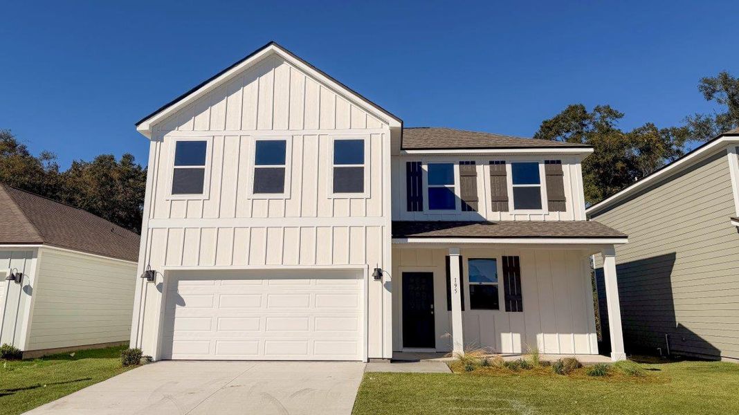 Front exterior of a new home in Misting Springs, Crawfordville, FL, highlighting curb appeal (Image 1). Front exterior of a new home in Misting Springs, Crawfordville, FL, highlighting curb appeal (Image 1).