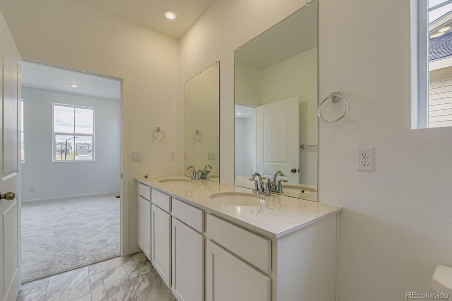 Furnished interior view inside a new home in Sky Ranch: Parkside Collection, Watkins (Image 5).