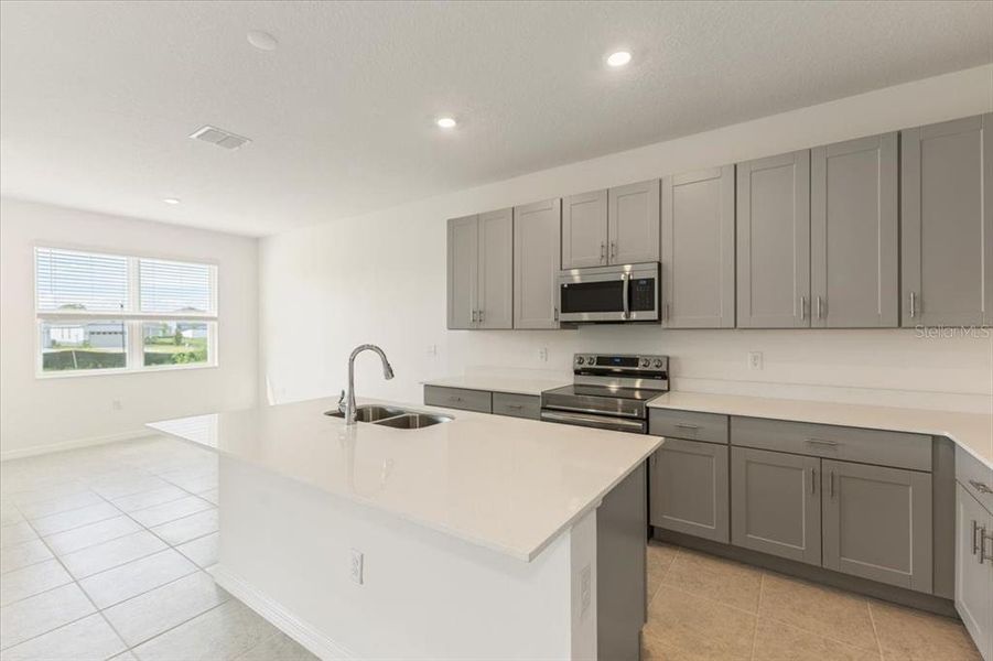 Furnished interior view inside a new home in Mirror Lake Village, Fruitland Park (Image 8).