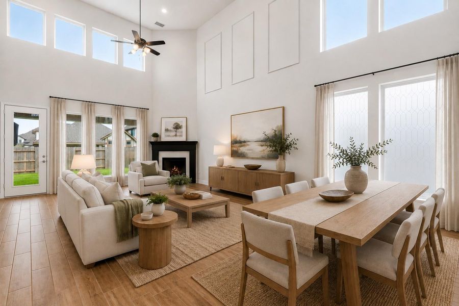 Soaring ceilings and oversized windows fill the home with natural light, creating a bright, open ambiance, while durable wood-look tile flooring adds warmth, style, and easy maintenance. *VIRTUALLY STAGED