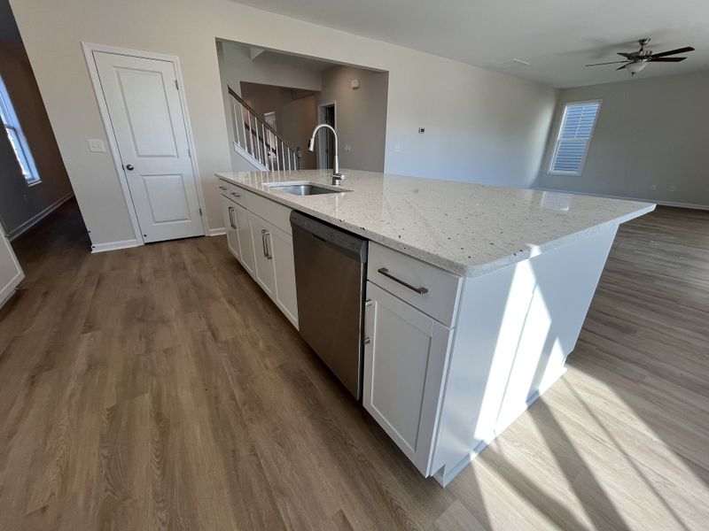 Furnished interior view inside a new home in River Tide Farms, Bolivia (Image 5).