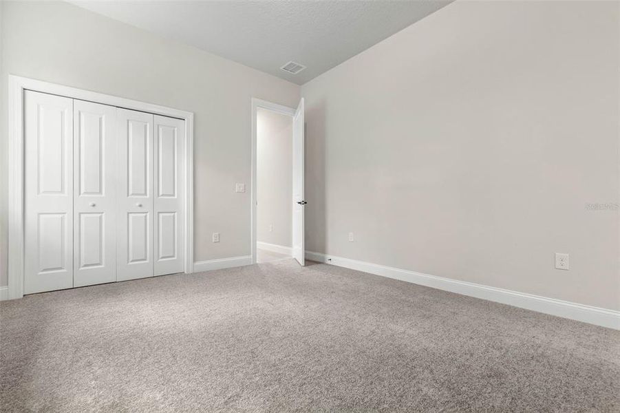 Spacious, unfurnished interior of a new home in Palm Coast Plantation, Palm Coast (Image 38).