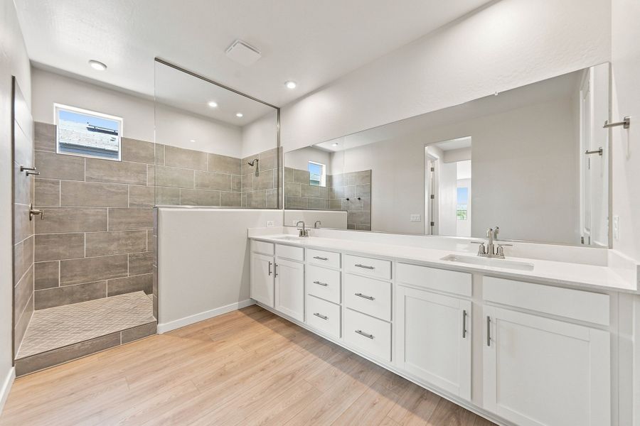 Furnished interior view inside a new home in Marbella at Windrose, Waddell (Image 11).