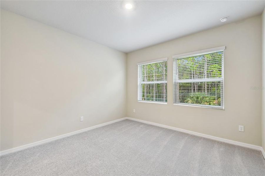 Spacious, unfurnished interior of a new home in Preserve at The Cays – The Harbor Series, Daytona Beach (Image 21). Spacious, unfurnished interior of a new home in Preserve at The Cays – The Harbor Series, Daytona Beach (Image 21).