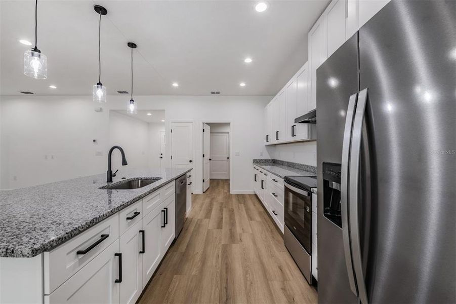 Furnished interior view inside a new home in , Dade City (Image 13).