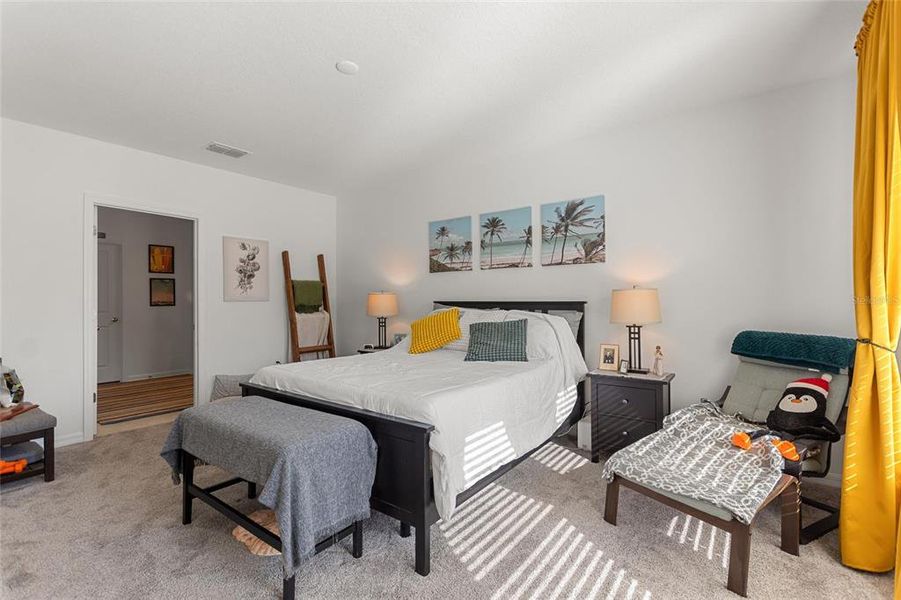 Furnished interior view inside a new home in Lawson Dunes: Estate Collection, Haines City (Image 25).