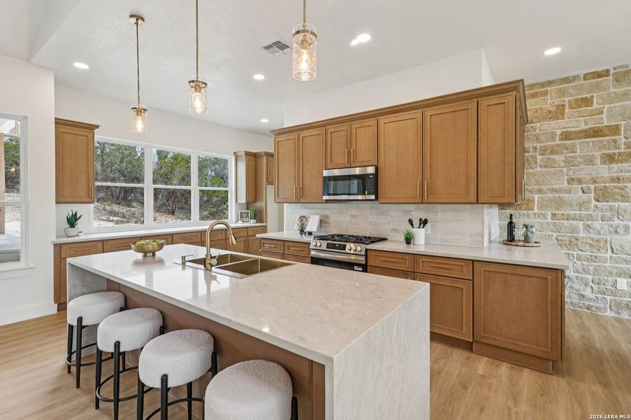 Furnished interior view inside a new home in , Fischer (Image 10).