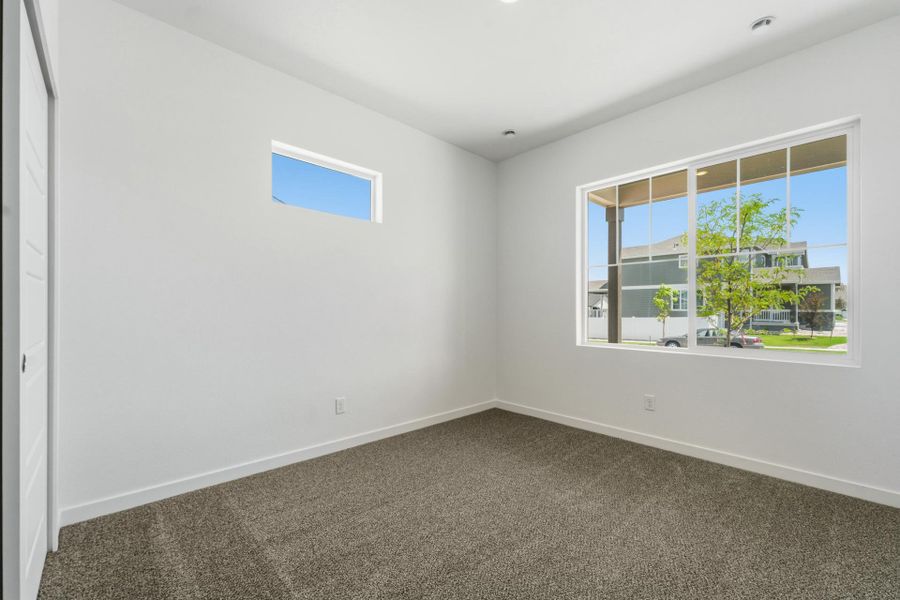 Spacious, unfurnished interior of a new home in Union Colony West, Greeley (Image 46).