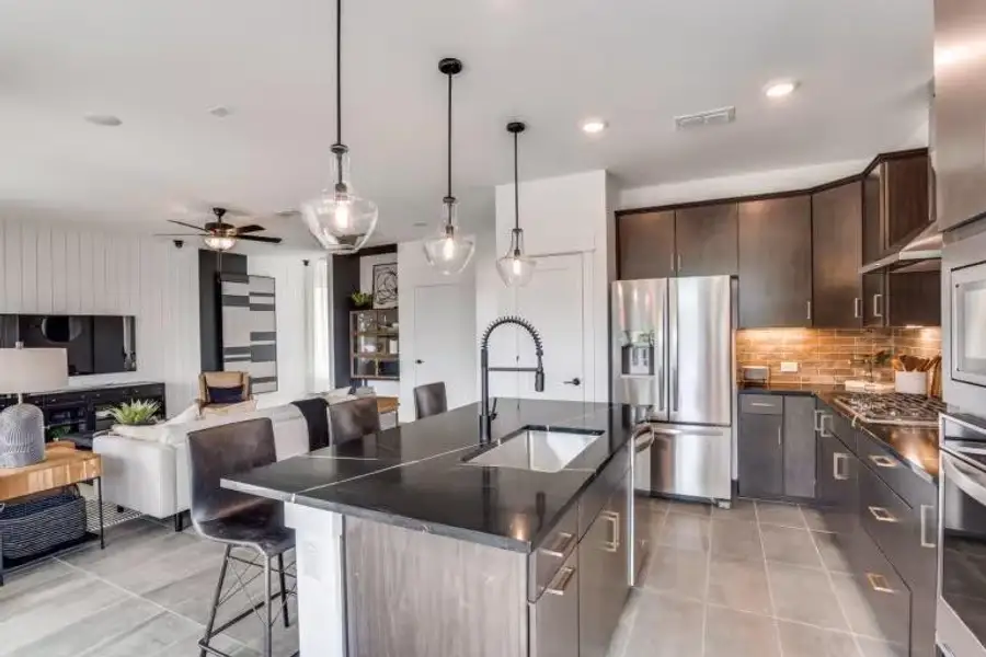 Photo of Pulte model home with same floor plan, not of actual home listed.