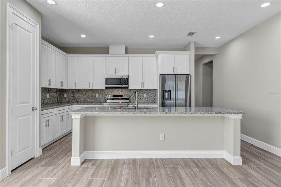 Furnished interior view inside a new home in , Summerfield (Image 15).