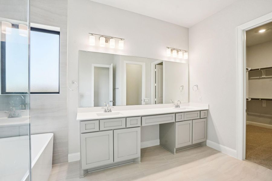 Furnished interior view inside a new home in Del Bello Lakes 60', Manvel (Image 12).