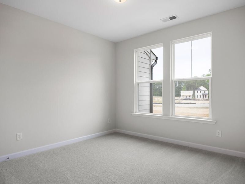 Spacious, unfurnished interior of a new home in Forestville Yard Townhomes, Knightdale (Image 11).