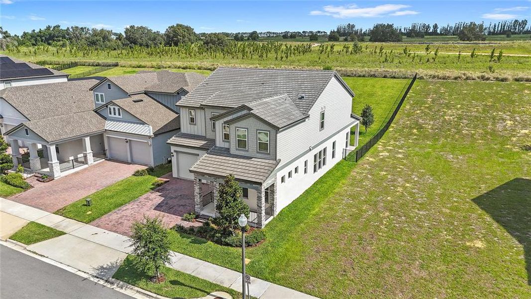 Front exterior of a new home in , Winter Garden, FL, highlighting curb appeal (Image 33).