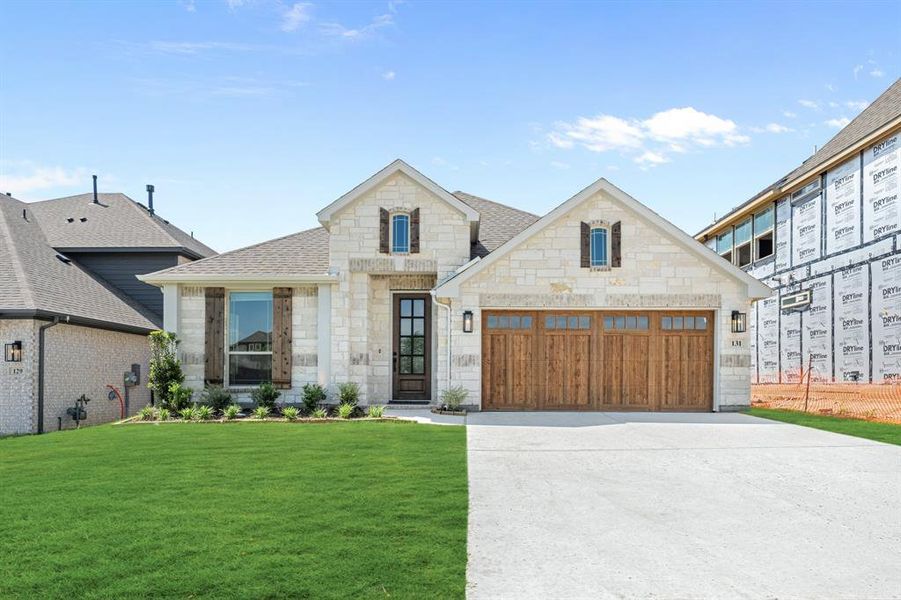 Front exterior of a new home in Parks of Aledo, Aledo, TX, highlighting curb appeal (Image 1). Front exterior of a new home in Parks of Aledo, Aledo, TX, highlighting curb appeal (Image 1).