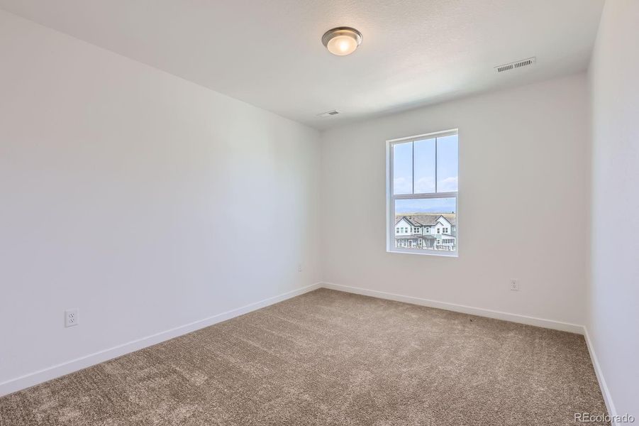 Spacious, unfurnished interior of a new home in Parterre: The Skyline Collection, Thornton (Image 10).