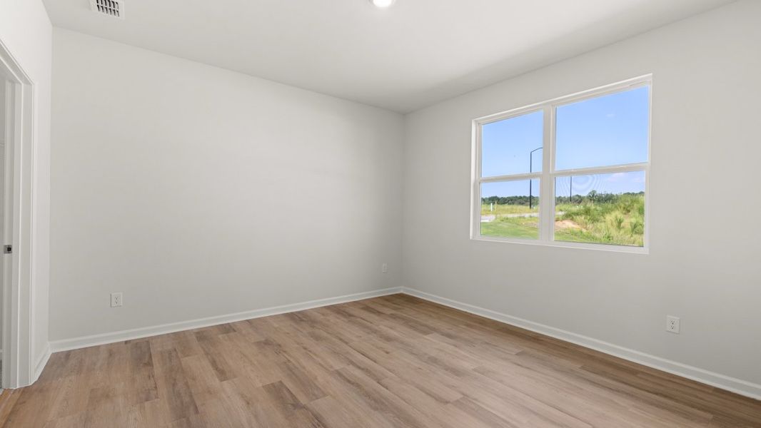 Representative unfurnished interior of a home built from the Freeport by D.R. Horton in Hamptons at Riverwood North, Dallas (Image 23).